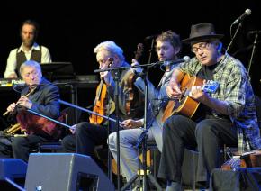 The Chieftains perform with Ry Cooder (right) at a concert in Glasgow