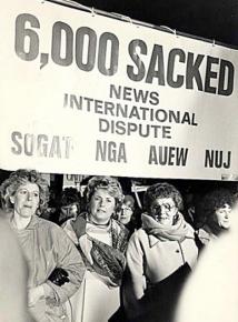 Strikers and their supporters march against Murdoch's union-busting