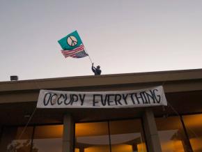 Outside the vacant bank reclaimed by occupiers in Santa Cruz