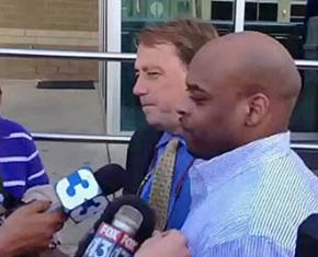 Timothy McKinney (right) faces questions with his lawyer after his release