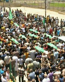 Mourning the Al Haj family in Gaza after they were killed by an Israeli offensive