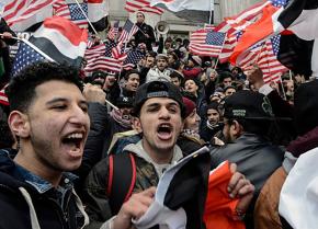 Yemeni bodega owners and workers rally at Brooklyn's Borough Hall against Trump's Muslim ban
